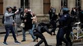 Scuffles break out as French strike to call for higher wages