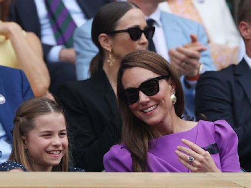 Kate, Britain's Princess of Wales, arrives to standing ovation at Wimbledon