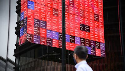 Asian Stocks Slump as Mideast Woes, Hawkish Fed Sour Sentiment