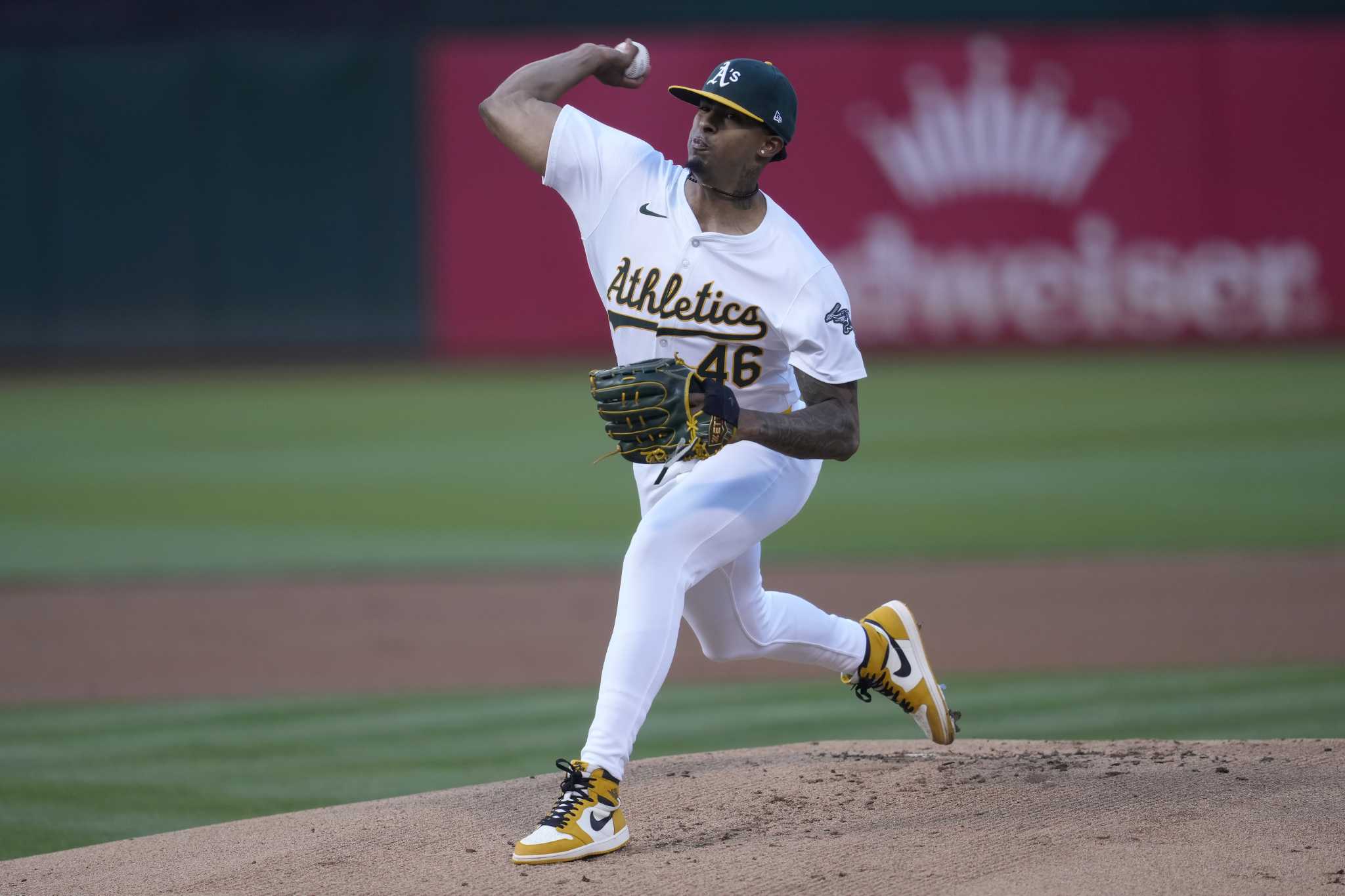 Luis Medina gets his 1st win in more than 11 months as the Athletics beat the Royals 5-1