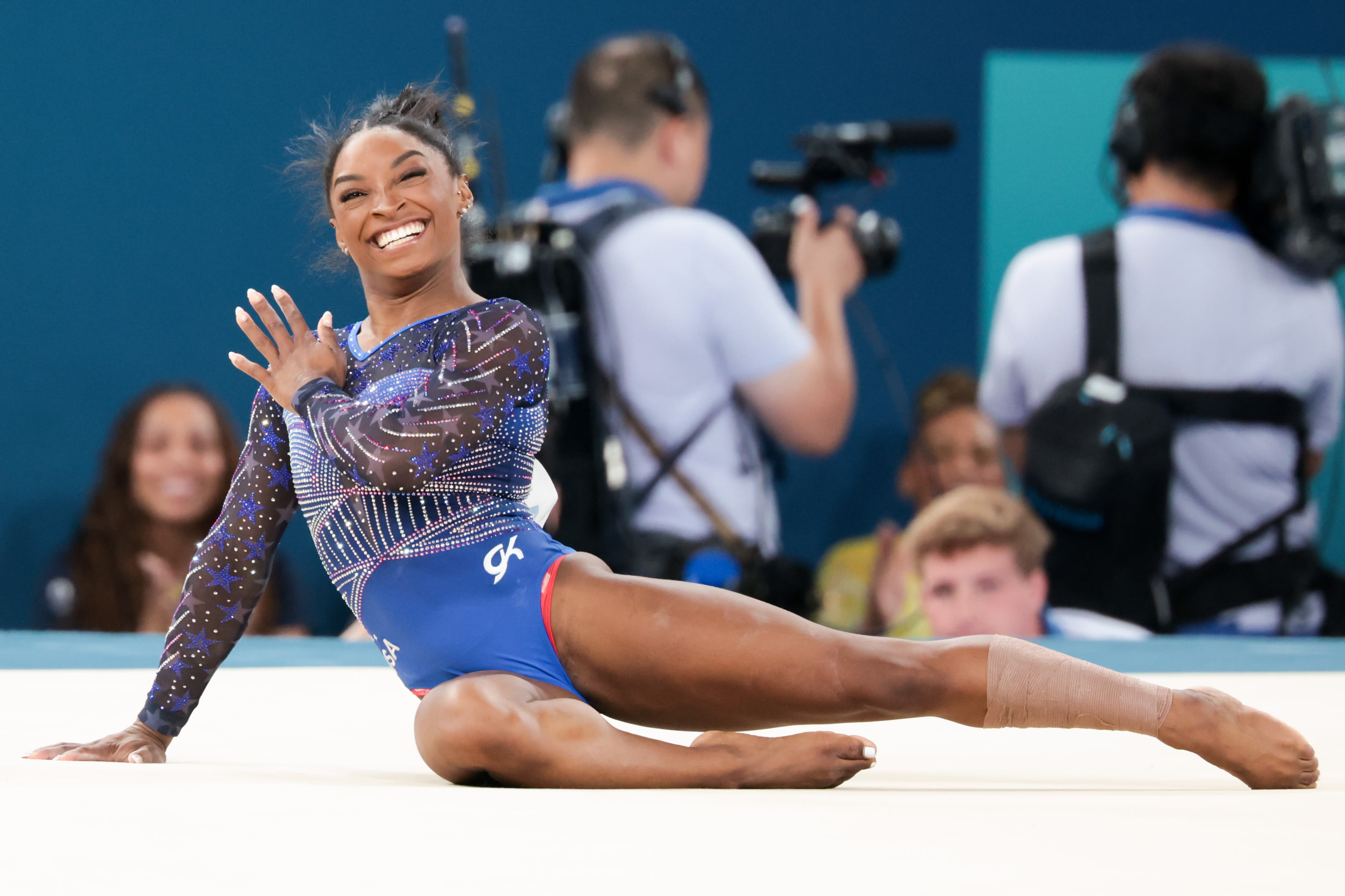 'It means the world to me.' Simone Biles wins historic Olympic all-around title