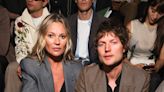 Kate Moss takes boyfriend Nikolai von Bismarck's arm joining Robert Pattinson and Demi Moore on Dior front row