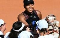 Naomi Osaka celebrates celebrates after beating Daria Kasatkina at the Rome Open