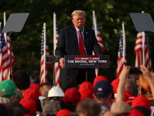 Trump met with ‘build the wall’ chants as he goes on anti-migrant rant at Bronx rally