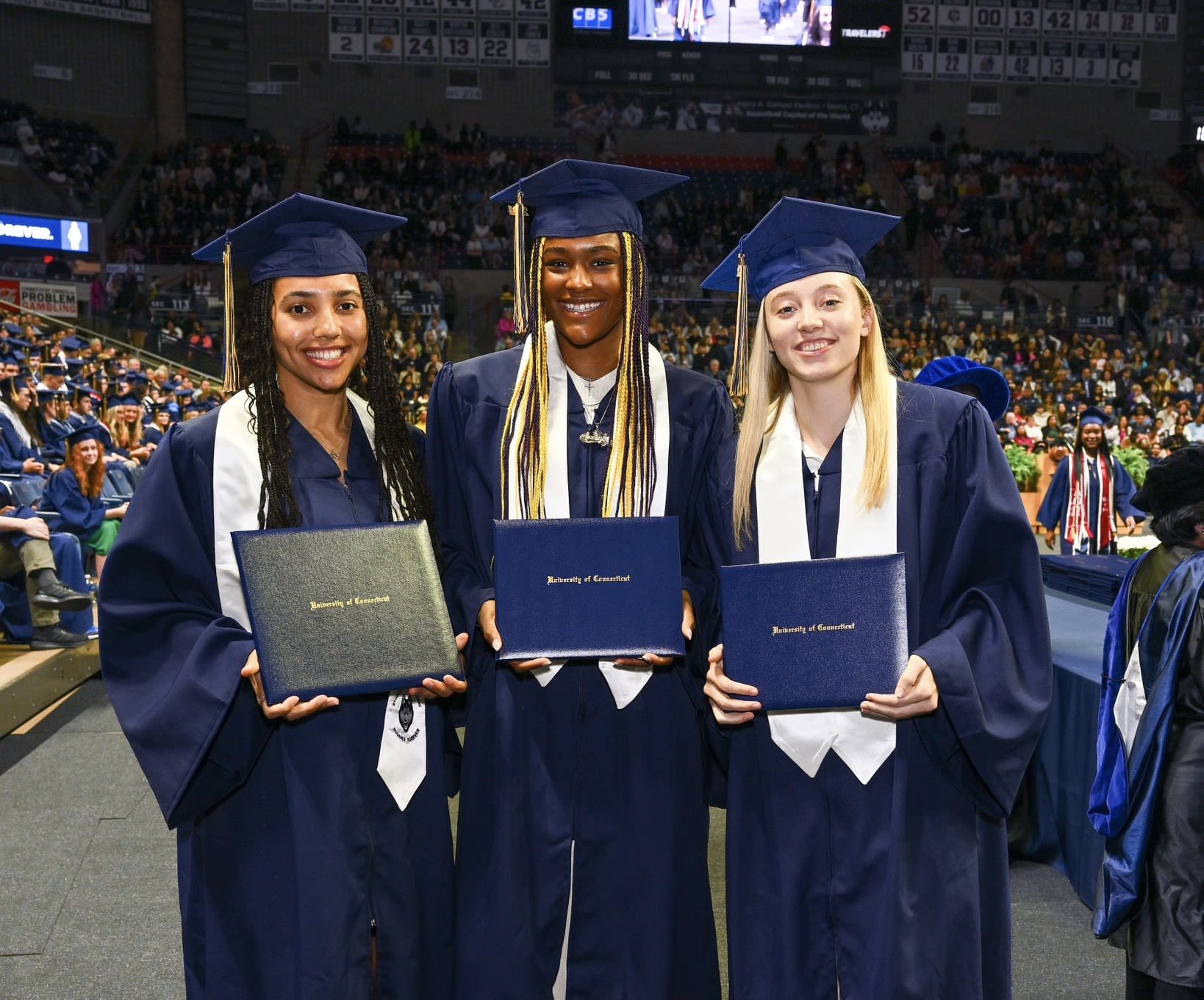 Paige Bueckers, Aaliyah Edwards dance at Gampel Pavilion as the UConn stars take part in graduation