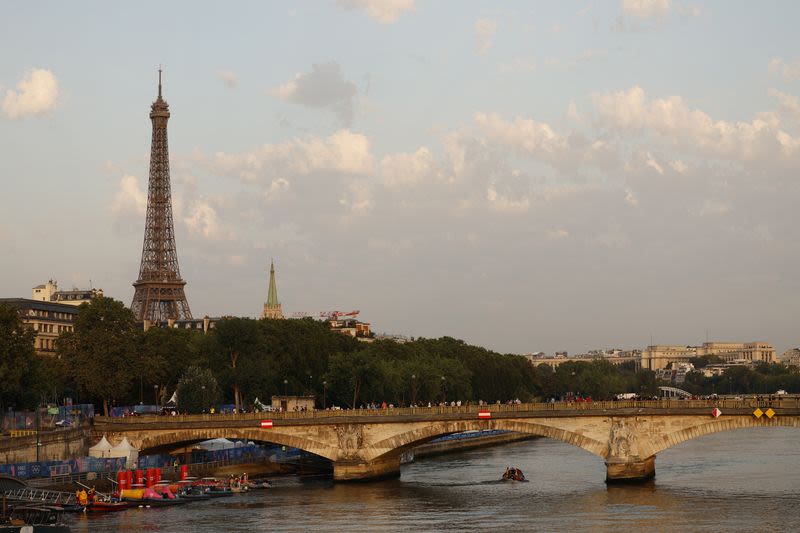 Olympics-Triathlon-Races to go ahead on Wednesday as Seine passes water quality tests