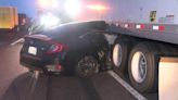 Car crashes into the back of a semi on Highway 99, dragged 200 feet