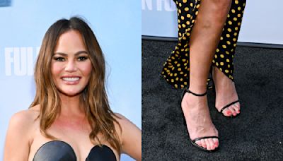 Chrissy Teigen Pops in Barely-There Heels for ‘A Man in Full’ Premiere