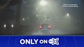 Dashcam video shows deadly storm blasting through downtown, shifting car and blowing out windows