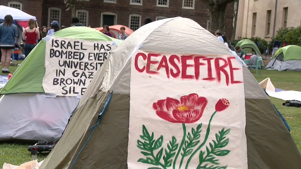 Brown University warns of possible discipline for encamped protesting students
