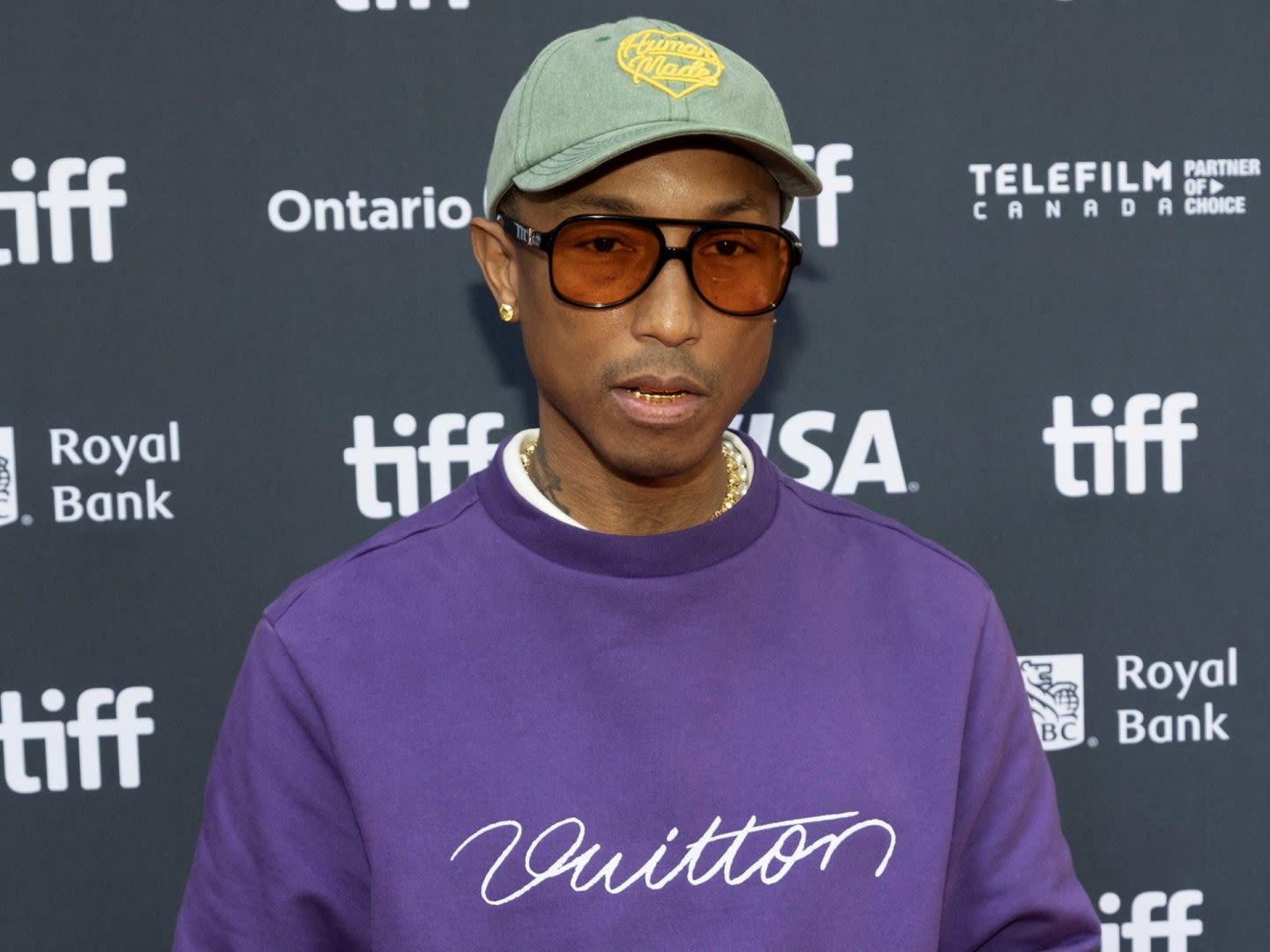 Pharrell Williams agrees with PETA protester during surprise exchange at TIFF