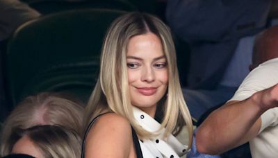 Pregnant Margot Robbie Cradles Baby Bump While at Wimbledon