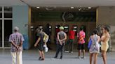 Long lines form and frustration grows as Cuba runs short of cash