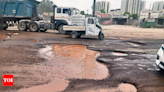 Gurgaon: Stretch on key NH8 link riddled with craters, commute a nightmare now | Gurgaon News - Times of India