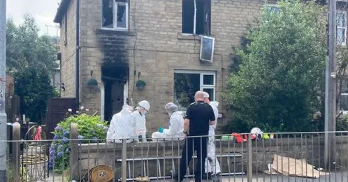 Woman dies and two kids fighting for life after 'suspicious' house fire