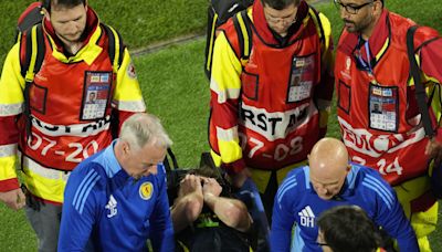 Fans gutted for Tierney after Scotland ace stretchered off in crunch Euros clash