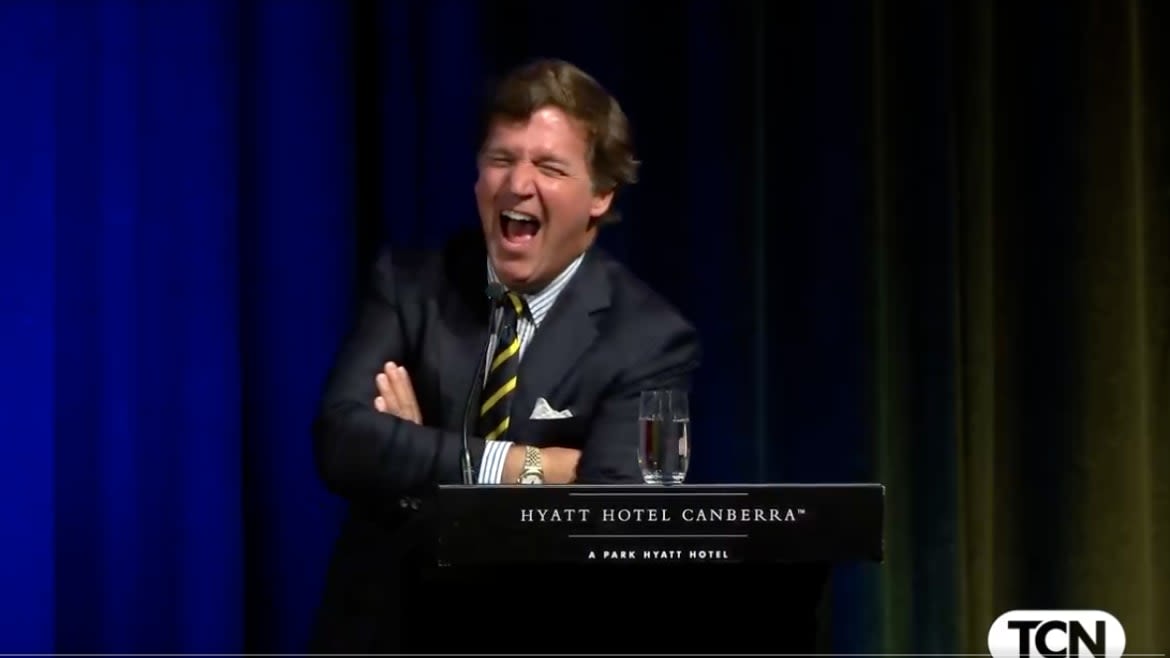 Tucker Carlson Takes on Australian Reporter After Searing Putin Question