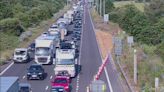 M25 lorry crash at Enfield leaves person hospitalised with serious injuries and 12 mile queues