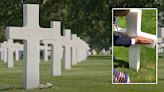 Every June 6th, French Citizens Honor Fallen American Soldiers By Rubbing Omaha Beach Sand On Their Gravestones