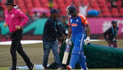 England hampered by rain after taking two early India wickets