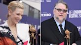 'Pinocchio' star Cate Blanchett and director Guillermo del Toro posed with a tiny figurine of the character at the London premiere
