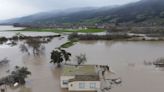 Rising California river could cut off some homes as storms resume