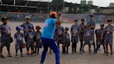 Baseball becomes a shelter for Venezuelan children in soccer-mad Peru