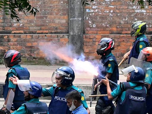 Bangladesh protesters set state TV HQ ablaze as toll mounts, internet cut