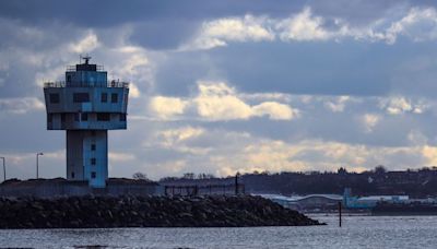 Rescuers search for boy missing after swimming with friends in the Mersey at Crosby beach