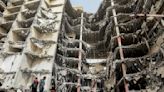 Iran building collapse kills 14 as mayor and others detained