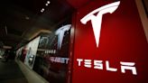 Tesla shares tumble below $150 per share