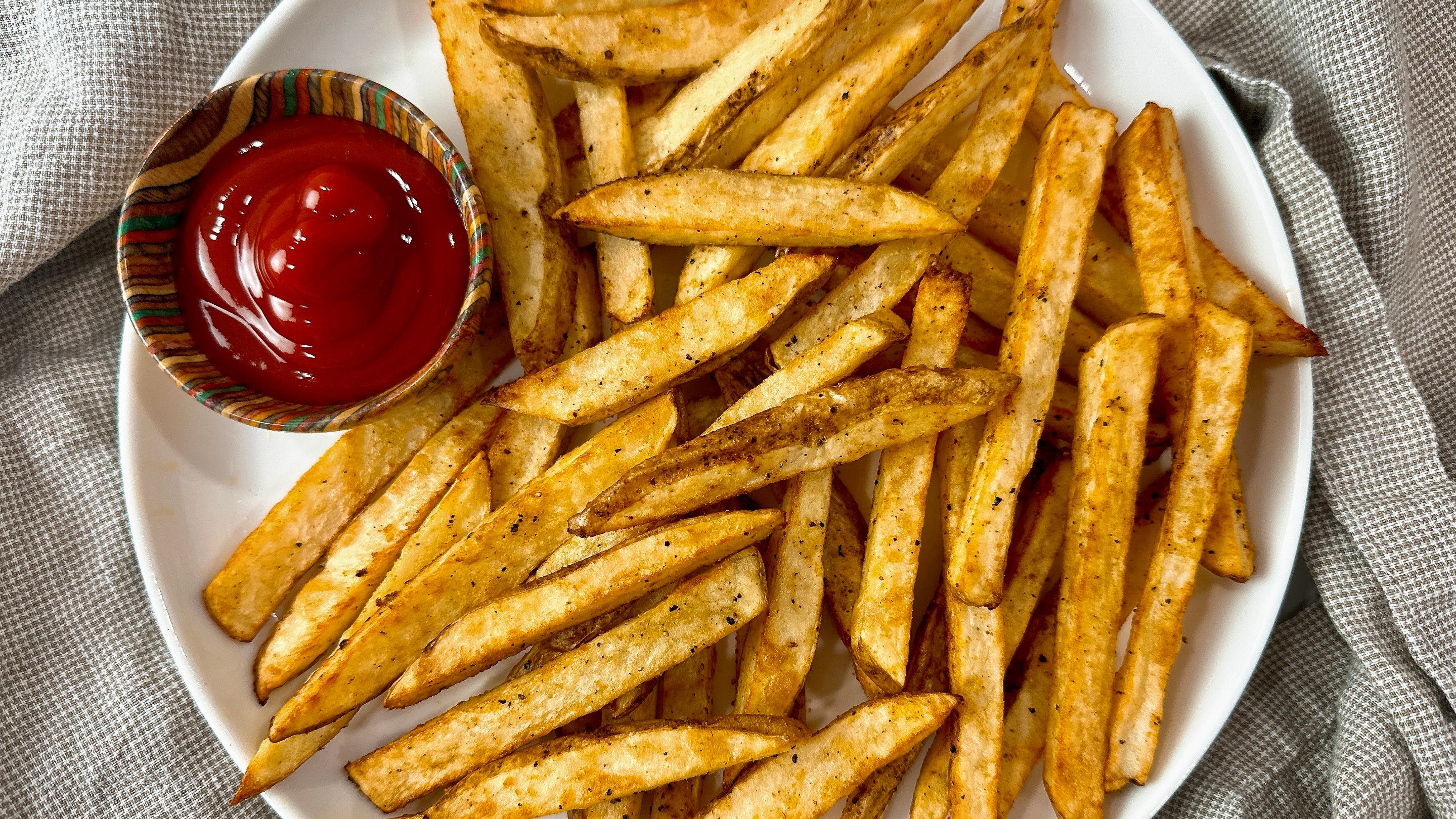 Air fryer french fries and sweet potato fries deliver all the crunch, none of the oily cleanup