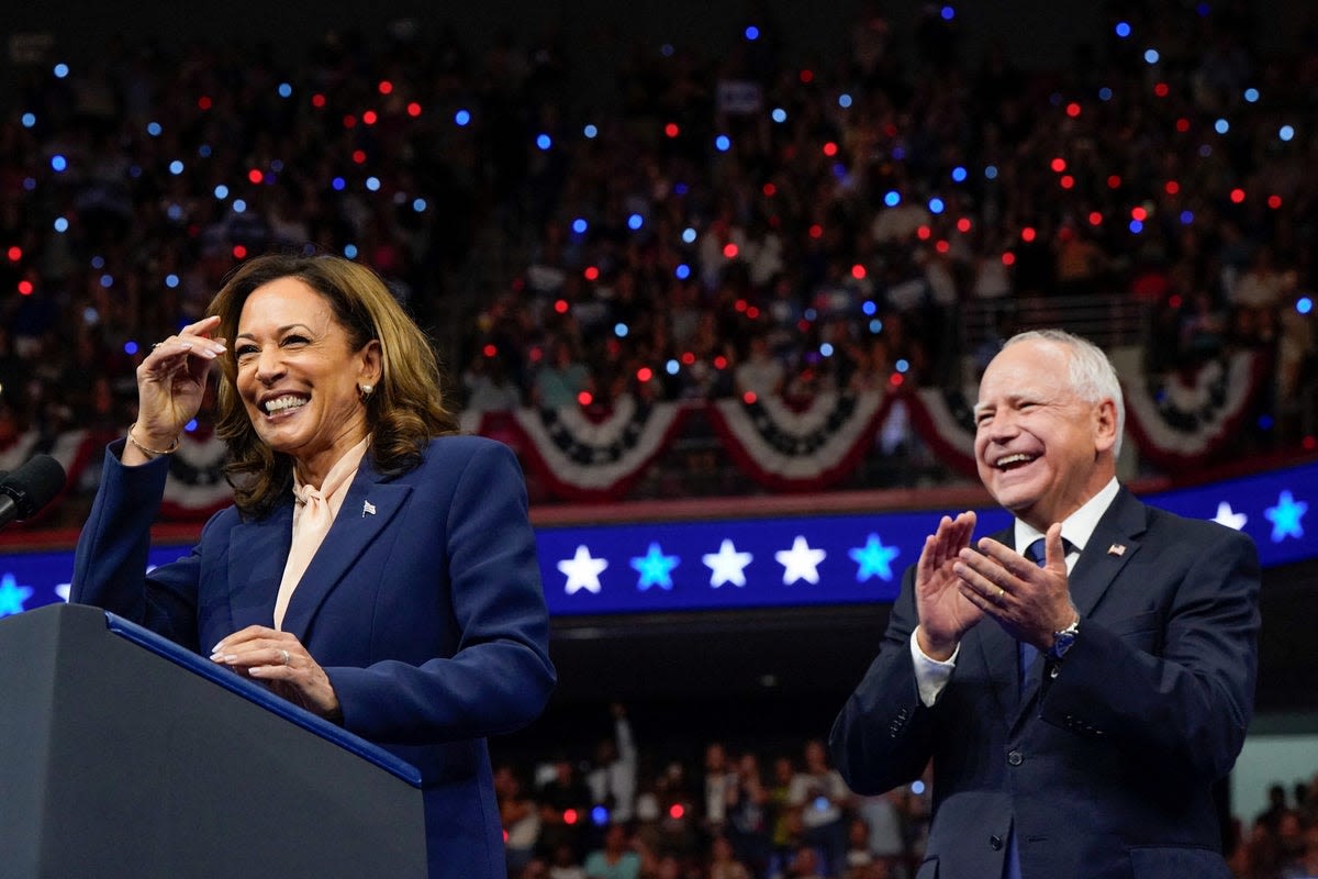 Tim Walz pulls no punches in first speech as Harris’s running mate at packed Philadelphia rally