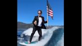 Mark Zuckerberg stuns netizens as he wishes ‘Happy Birthday America’ while surfing in tux with US flag in hand