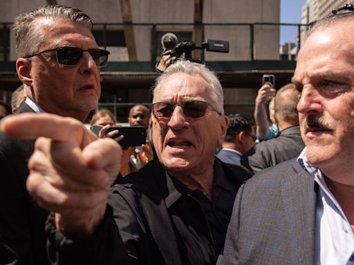 Trump is a ‘clown’ who will become ‘dictator for life’, says De Niro outside court