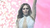 Cheryl sets pulses racing in skintight bodysuit