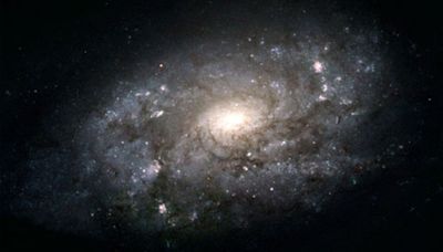 Tiny bright objects emitting ancient starlight could upend theory of galaxy formation