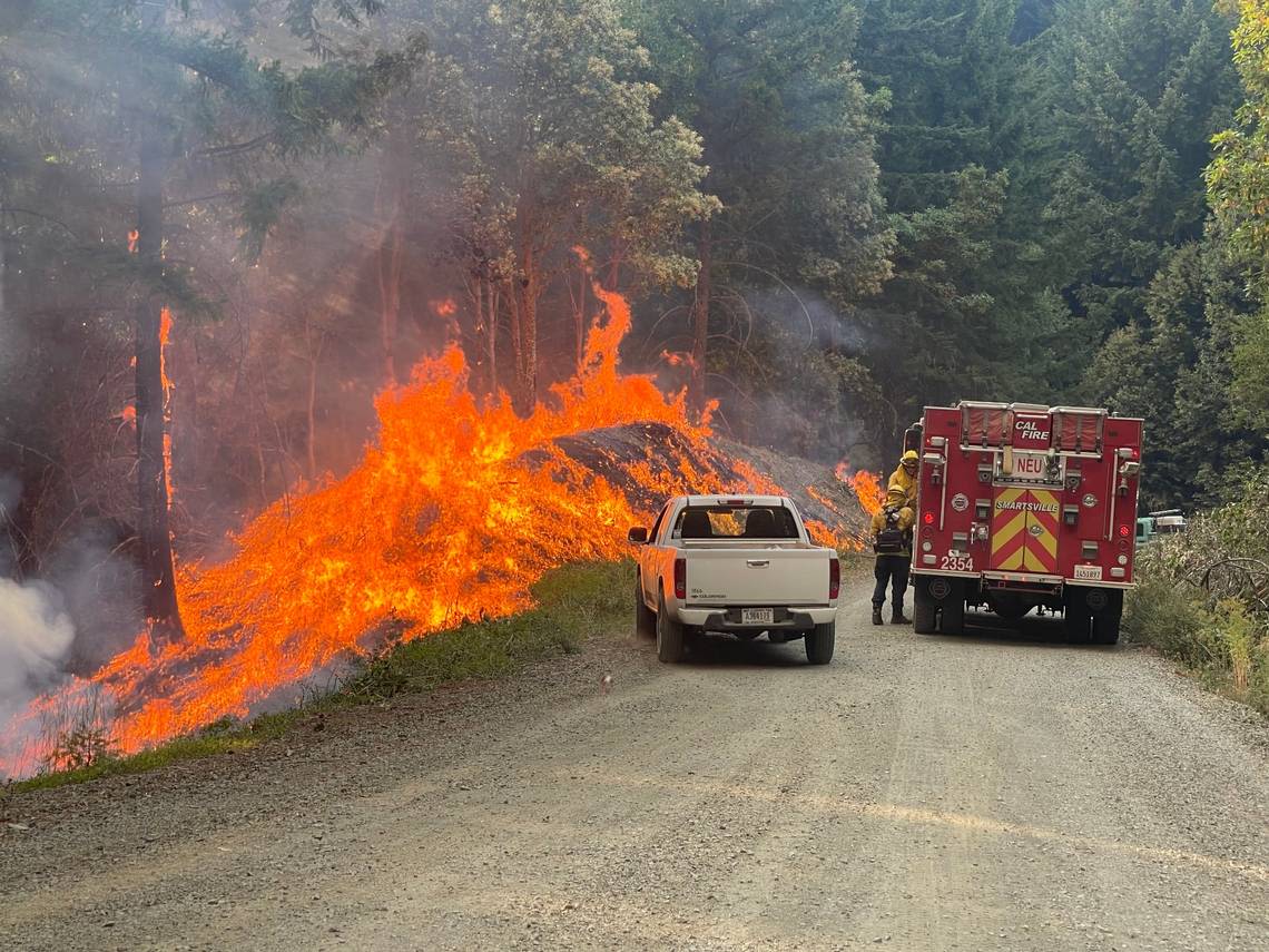 Northern California fires continue to burn in high heat, gusty wind. Several firefighters injured