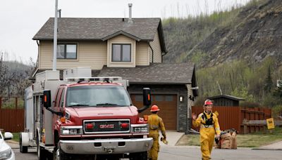 Rain, cooler temperatures reduce wildfire risk in Fort McMurray