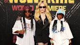 Madonna Suits Up in Saint Laurent Tuxedo With Twin Daughters in ’90s-inspired Streetwear Looks at ‘Deadpool & Wolverine’ Premiere