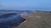 California firefighters battle wind-driven wildfire east of San Francisco overnight