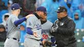 Dodgers infielders struggle with rain-soaked conditions in loss to Cubs