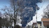 Crews release toxic chemicals from derailed tankers in Ohio