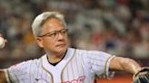 Nvidia CEO Jensen Huang throws out the opening pitch before a baseball game at the Taipei Dome