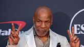 Man punched by Mike Tyson on plane demands $450,000. Lawyer says ex-champ won't pay 'shakedown'