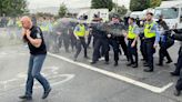 Protesters hurl 'missiles'at police at Dublin factory set for migrants