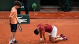 French Open: Djokovic wins again in 5 sets, but uncertain if he’ll continue