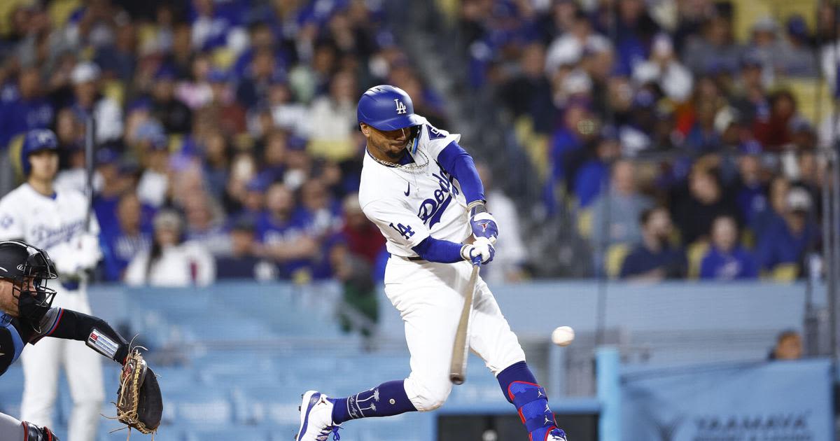 Mookie Betts of the Los Angeles Dodgers singles against the Miami Marlins in the fourth inning at Dodger Stadium on Monday, May 6, 2024, in Los Angeles.