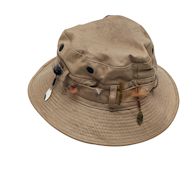 A soft, wide-brimmed hat with a downward sloping brim. Originally designed for outdoor activities like fishing and hiking. Popular among fashion-conscious youth in the 1990s and 2000s, and has recently made a comeback.