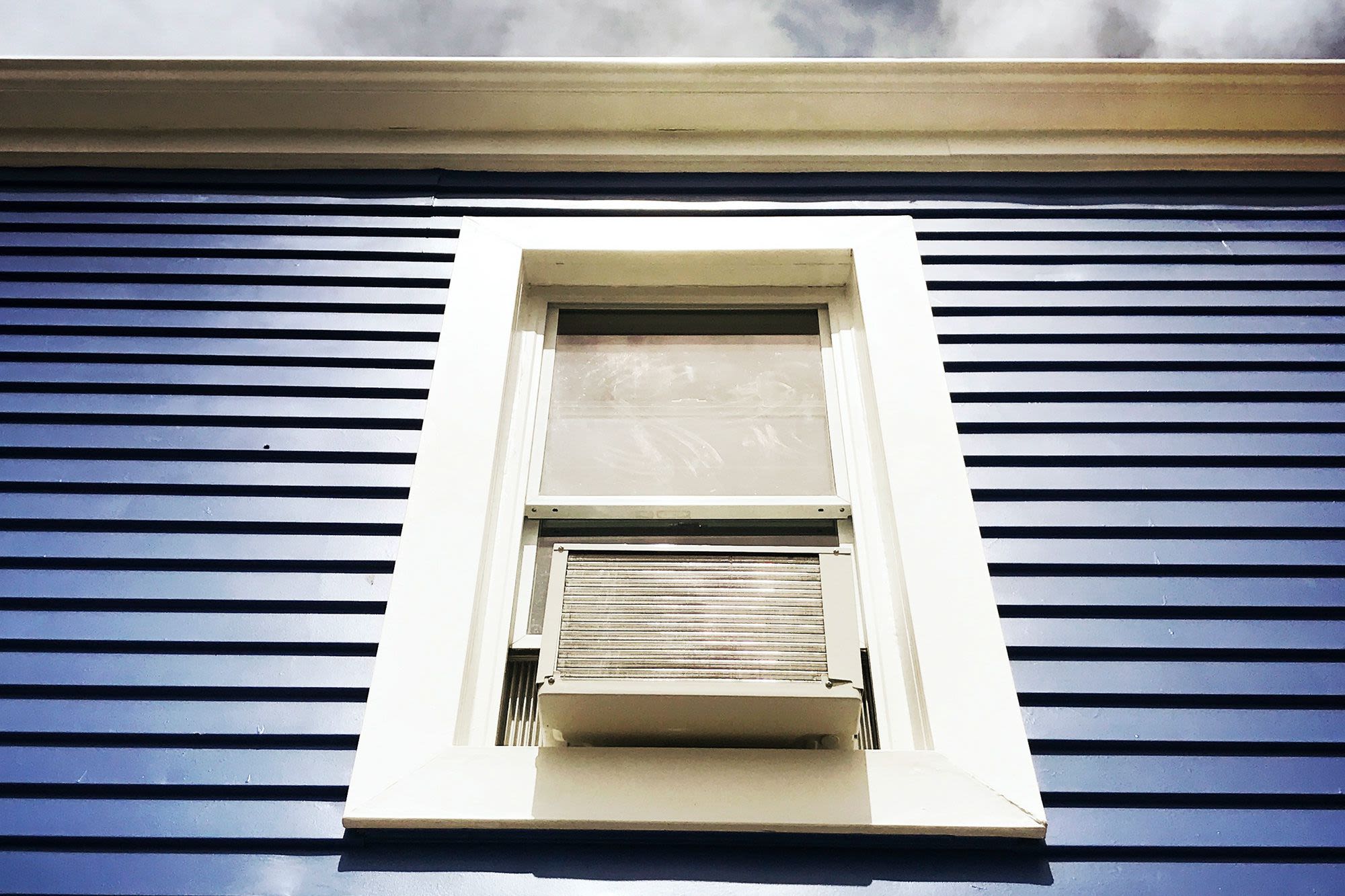 How to Install a Window Air Conditioning Unit to Keep Your Home Cool